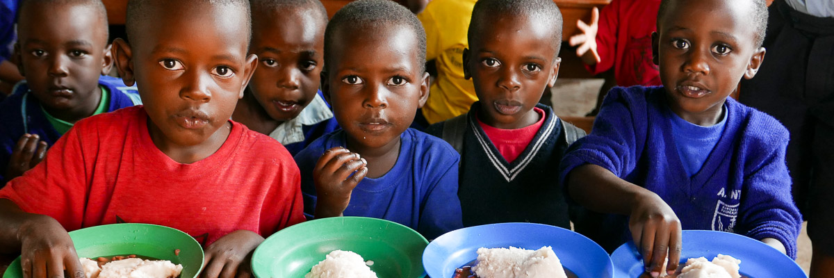 Children at Kirima Primary getting school lunch