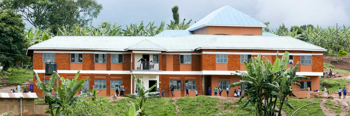 Kirima School classroom with hall & resource centre behind